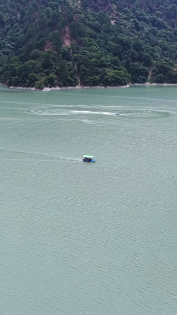 Vertical Aerial View of Chamera Lake with Speedboat, Himachal Pradesh, India