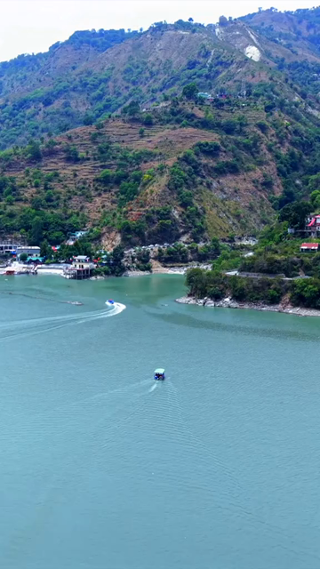 Vertical Aerial View of Chamera Lake with Speedboat, Himachal Pradesh, India