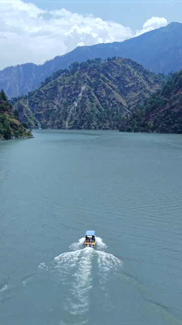 Vertical Aerial View of Chamera Lake with Speedboat, Himachal Pradesh, India
