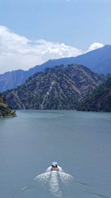 Vertical Aerial View of Chamera Lake with Speedboat, Himachal Pradesh, India