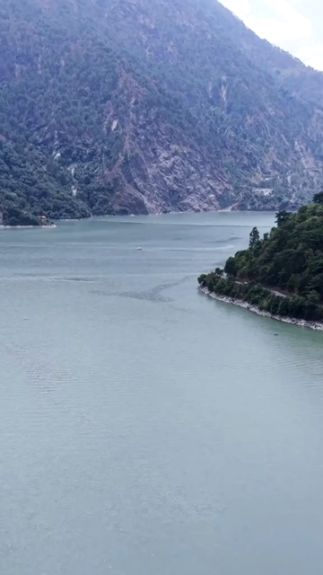 Vertical Aerial View of Chamera Lake with Speedboat, Himachal Pradesh, India