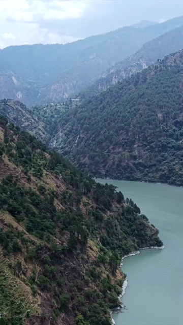 Vertical Aerial View of Chamera Lake with Speedboat, Himachal Pradesh, India