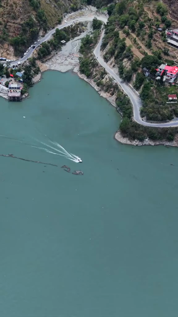 Vertical Aerial View of Chamera Lake with Speedboat, Himachal Pradesh, India