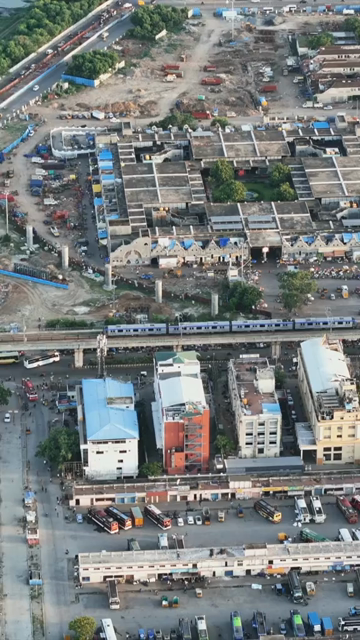 Vertical Aerial View of Chennai Metro Train and Cityscape India
