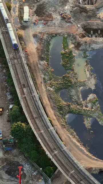 Vertical Aerial View of Chennai Metro Train and Cityscape India