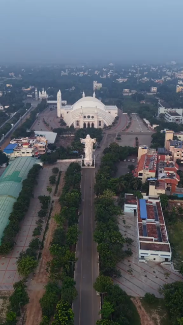 Vertical Aerial View of Morning Star Church and Jesus Statue in Velankanni Tamil Nadu