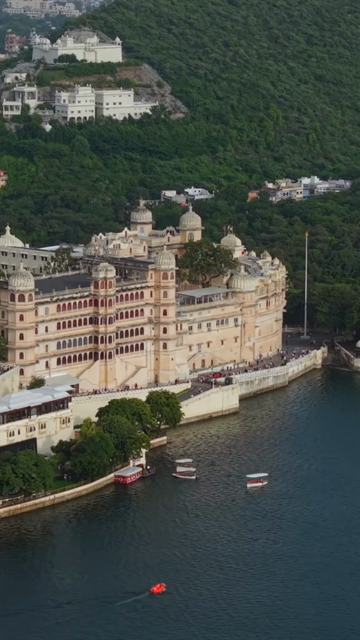Vertical Aerial View of City Palace and Lake Pichola Udaipur Rajasthan India
