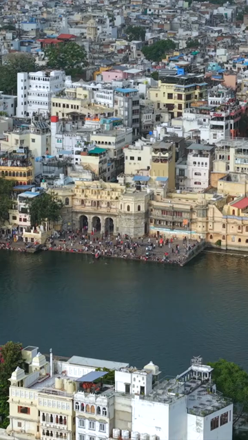 Vertical Aerial View of City Palace and Lake Pichola Udaipur Rajasthan India