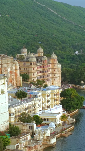 Vertical Aerial View of City Palace and Lake Pichola Udaipur Rajasthan India