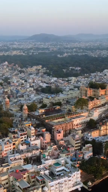 Vertical Aerial View of City Palace and Lake Pichola Udaipur Rajasthan India