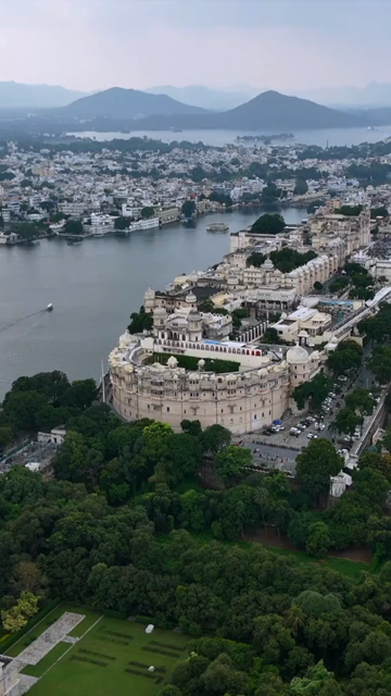 Vertical Aerial View of City Palace and Lake Pichola Udaipur Rajasthan India