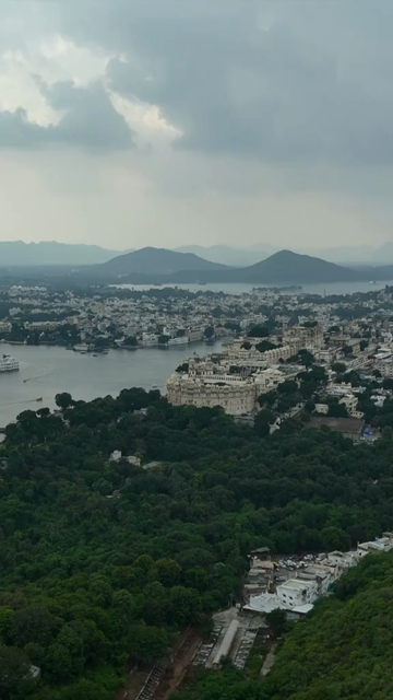 Vertical Aerial View of City Palace and Lake Pichola Udaipur Rajasthan India