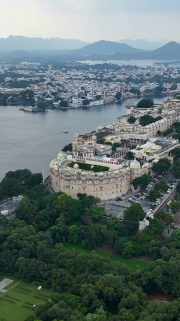 Vertical Aerial View of City Palace and Lake Pichola Udaipur Rajasthan India