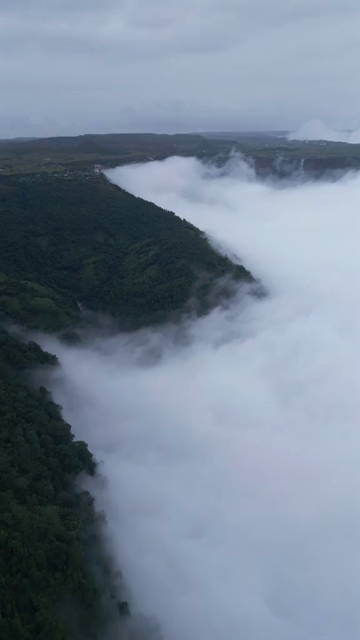 Vertical Aerial View of Cloud Covered Hills in Meghalaya, India