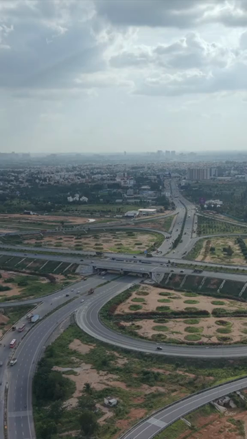 Vertical Aerial View of Cloverleaf Flyover and STRR Junction, Hoskote, Bengaluru, Karnataka