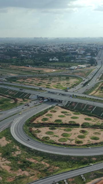 Vertical Aerial View of Cloverleaf Flyover and STRR Junction, Hoskote, Bengaluru, Karnataka