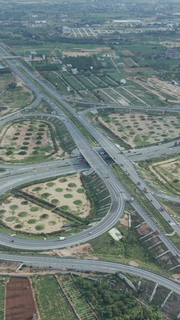Vertical Aerial View of Cloverleaf Flyover and STRR Junction, Hoskote, Bengaluru, Karnataka