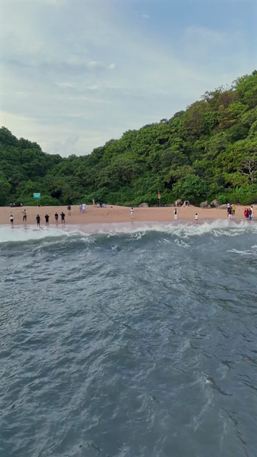 Vertical Aerial View of Cola Beach and Emerald Lagoon in South Goa, India
