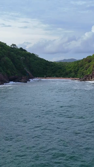 Vertical Aerial View of Cola Beach and Emerald Lagoon in South Goa, India