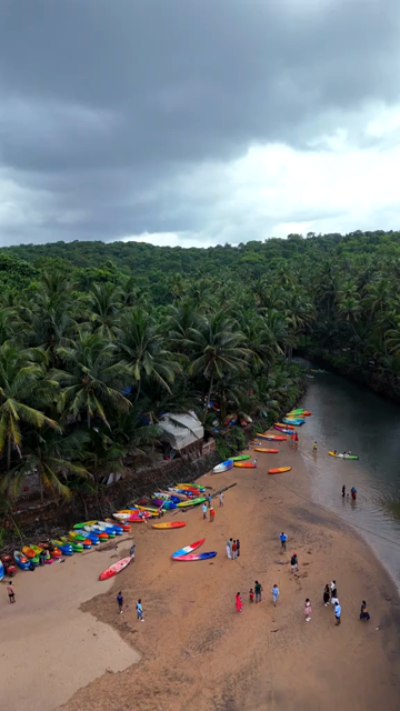 Vertical Aerial View of Cola Beach and Emerald Lagoon in South Goa, India