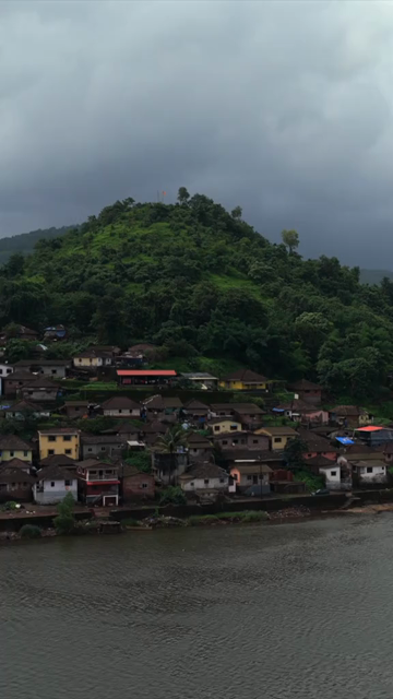 Vertical Aerial View of Dasgaon Village and Savitri River with Konkan Railway Bridge Maharashtra