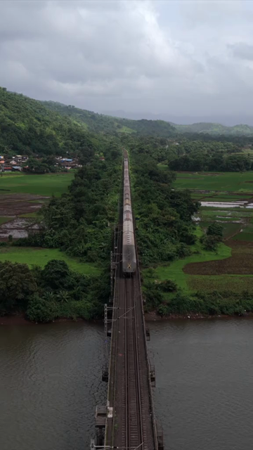 Vertical Aerial View of Dasgaon Village and Savitri River with Konkan Railway Bridge Maharashtra