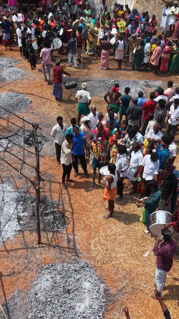 27th April 2026 : Vertical Aerial View of Firewalking Ceremony at Kundrakudi Murugan Temple Festival in Sivaganga India