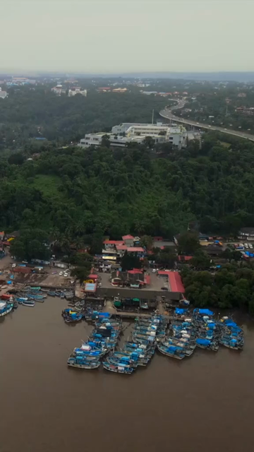 Vertical Aerial View of Fishing Boats on Mandovi River Goa India