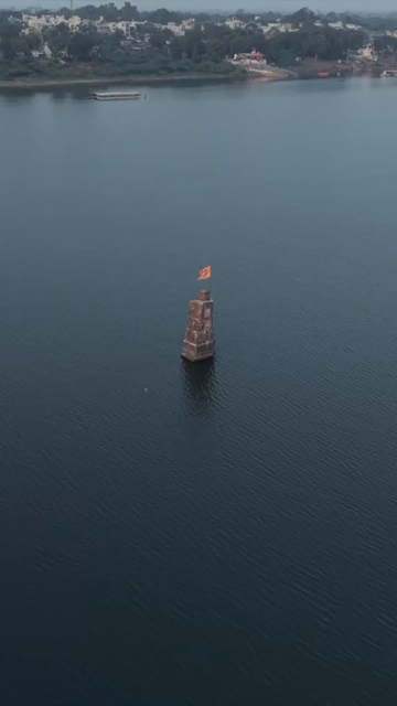 Vertical Aerial View of Saffron Shiva Flag in the Narmada River, Madhya Pradesh