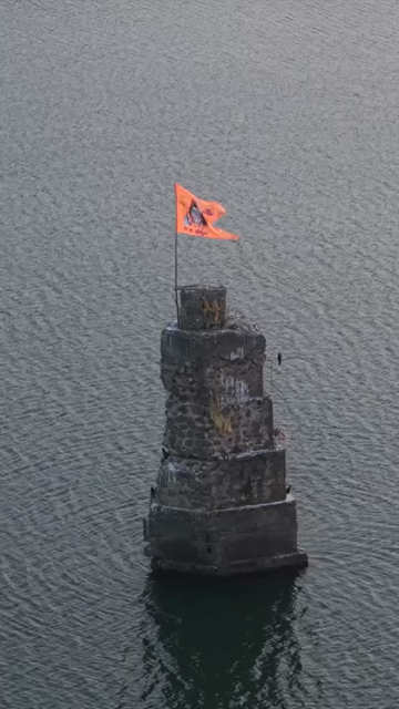 Vertical Aerial View of Saffron Shiva Flag in the Narmada River, Madhya Pradesh