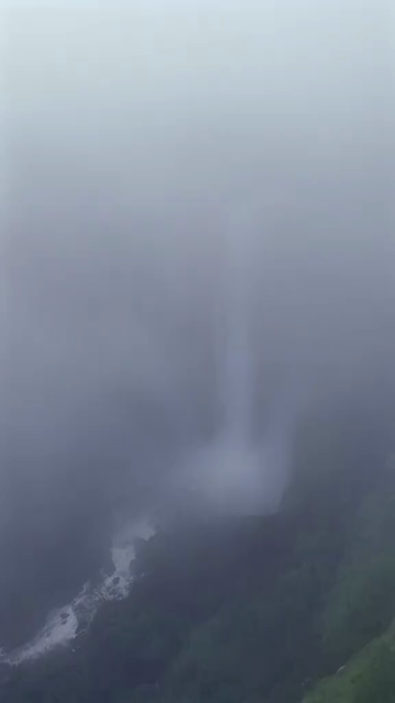 Vertical Aerial View of Fog and Waterfall in Maharashtra India