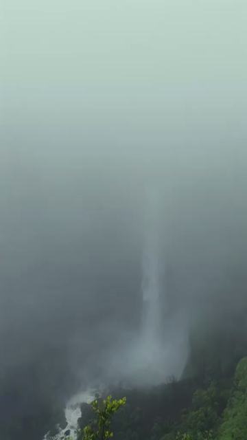 Vertical Aerial View of Fog and Waterfall in Maharashtra India
