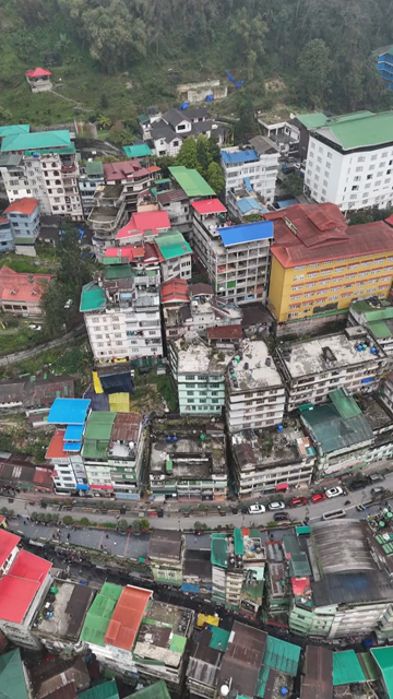 Vertical Aerial View of Gangtok Cityscape and Hillside Buildings Sikkim India