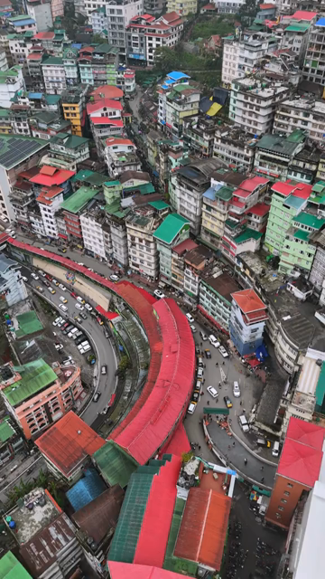 Vertical Aerial View of Gangtok Cityscape and Hillside Buildings Sikkim India