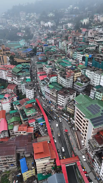 Vertical Aerial View of Gangtok Cityscape and Hillside Buildings Sikkim India