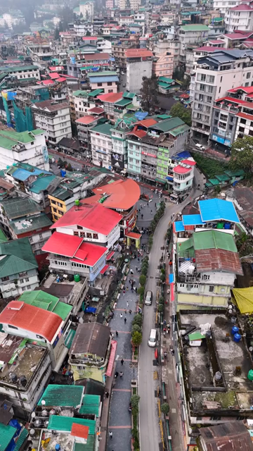 Vertical Aerial View of Gangtok Cityscape and Hillside Buildings Sikkim India