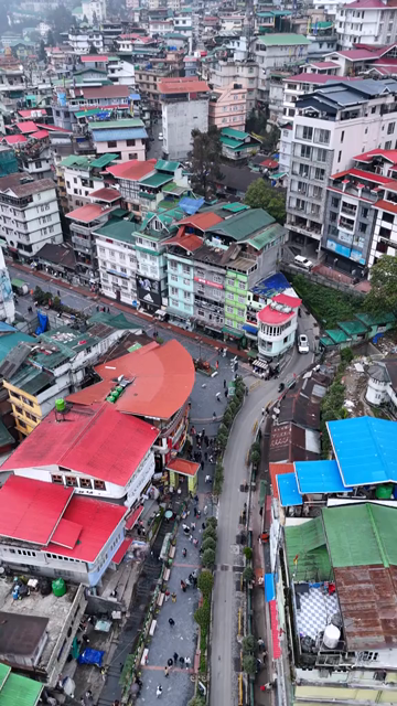 Vertical Aerial View of Gangtok Cityscape and Hillside Buildings Sikkim India