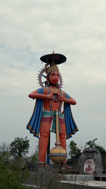 Vertical Aerial View of Giant Hanuman Statue and Hindu Temple in Jabalpur