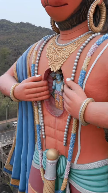 Vertical Aerial View of Giant Hanuman Statue and Hindu Temple in Jabalpur