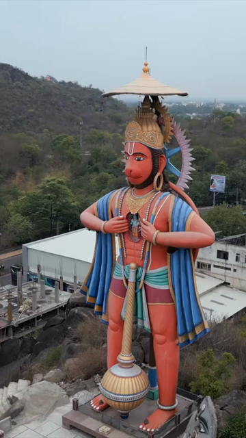Vertical Aerial View of Giant Hanuman Statue and Hindu Temple in Jabalpur