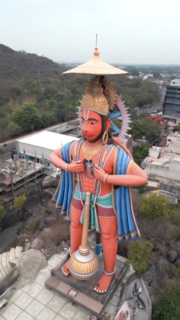 Vertical Aerial View of Giant Hanuman Statue and Hindu Temple in Jabalpur
