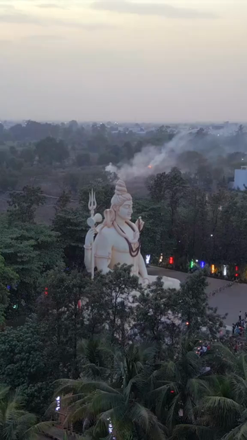 Vertical Aerial View of Giant Lord Shiva Statue and Devotees in Jabalpur