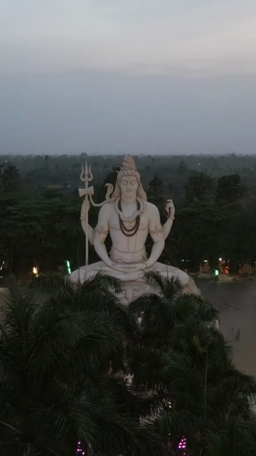 Vertical Aerial View of Giant Lord Shiva Statue and Devotees in Jabalpur