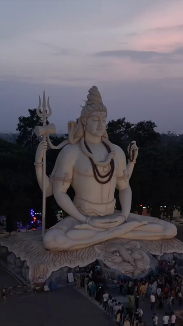 Vertical Aerial View of Giant Lord Shiva Statue and Devotees in Jabalpur