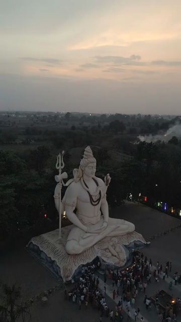 Vertical Aerial View of Giant Lord Shiva Statue and Devotees in Jabalpur