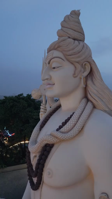 Vertical Aerial View of Giant Lord Shiva Statue and Devotees in Jabalpur