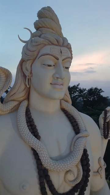 Vertical Aerial View of Giant Lord Shiva Statue and Devotees in Jabalpur