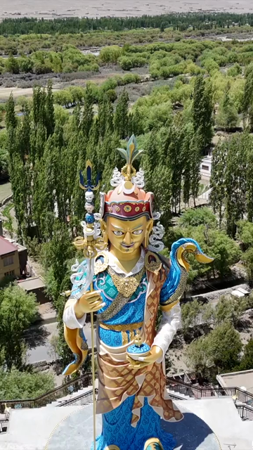 Vertical Aerial View of Guru Padmasambhava Statue and Himalayan Landscape in Ladakh India