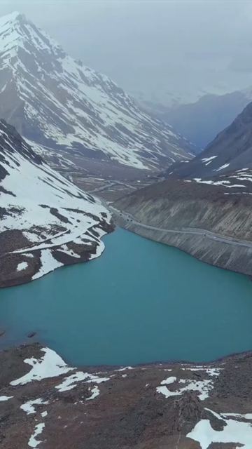 Vertical Aerial View of High Altitude Lake and Mountain Road in Ladakh