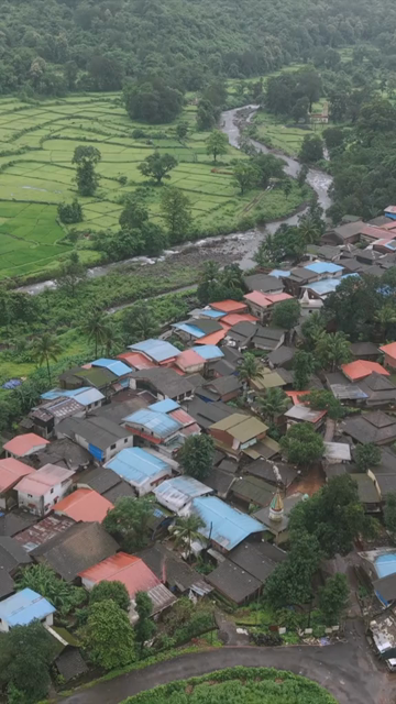 Vertical Aerial View of Lush Green Hills and Winding Roads in Ratnagiri Maharashtra India